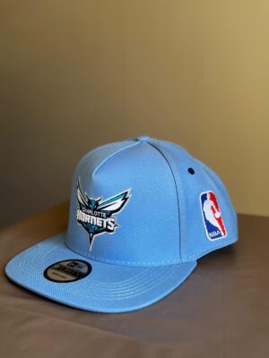 WhatsApp Image 2025-01-23 at 02.42.55 (2) Gorra Hornets plana regulable